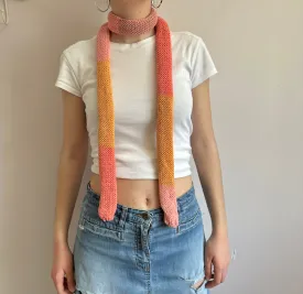 Handmade knitted colour block skinny scarf in coral and orange